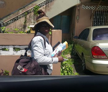 Tunapuna best PostLady and M.P. delivering Mail