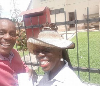 Tunapuna best PostLady and M.P. delivering Mail