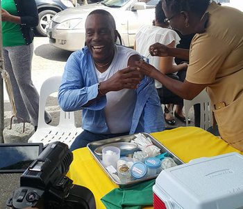 FLU Shots at Tunapuna Market with Minister of Health Terrence Deyalsingh.