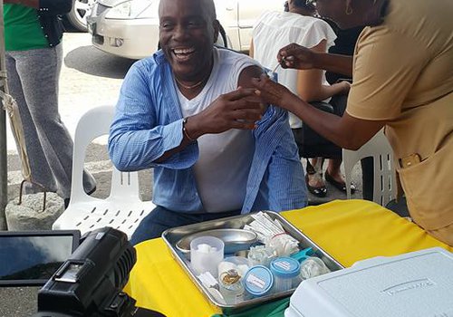 FLU Shots at Tunapuna Market with Minister of Health Terrence Deyalsingh.