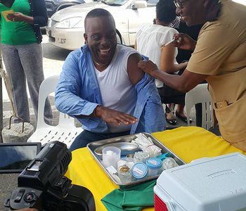 FLU Shots at Tunapuna Market with Minister of Health Terrence Deyalsingh.