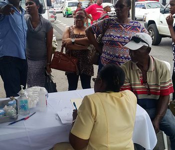 FLU Shots at Tunapuna Market with Minister of Health Terrence Deyalsingh.