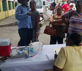 FLU Shots at Tunapuna Market with Minister of Health Terrence Deyalsingh.