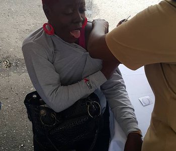 FLU Shots at Tunapuna Market with Minister of Health Terrence Deyalsingh.