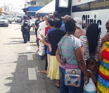 FLU Shots at Tunapuna Market with Minister of Health Terrence Deyalsingh.