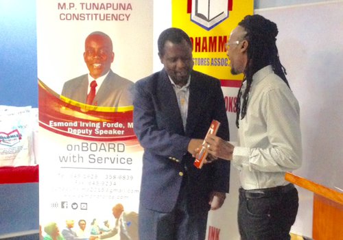 Distribution of school books and stationery for constituents at the Office of the M.P. for Tunapuna, Esmond Forde