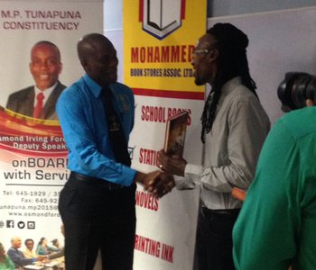 Distribution of school books and stationery for constituents at the Office of the M.P. for Tunapuna, Esmond Forde