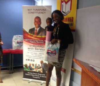 Distribution of school books and stationery for constituents at the Office of the M.P. for Tunapuna, Esmond Forde