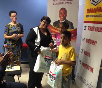 Distribution of school books and stationery for constituents at the Office of the M.P. for Tunapuna, Esmond Forde