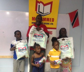 Distribution of school books and stationery for constituents at the Office of the M.P. for Tunapuna, Esmond Forde