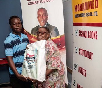 Distribution of school books and stationery for constituents at the Office of the M.P. for Tunapuna, Esmond Forde