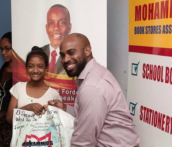 Distribution of school books and stationery for constituents at the Office of the M.P. for Tunapuna, Esmond Forde