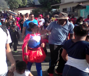 The M.P. participates in a Walkathon in conjunction with the Tunapuna Presbyterian Primary School Children, Teachers and Parents